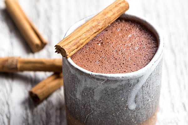 hot chocolate and cinnamon sticks